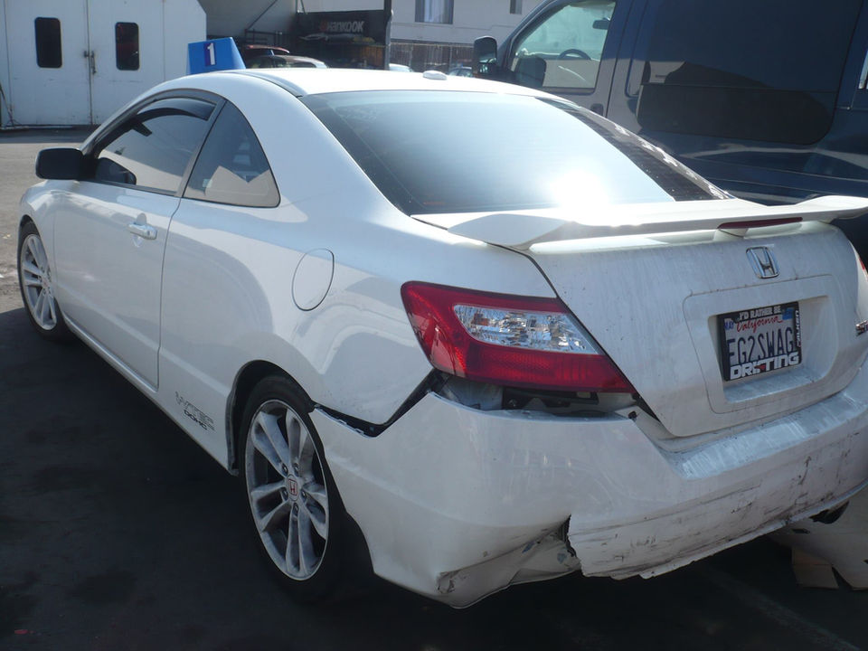 Mechanic working on car, offering of A-One Auto Center's skilled technicians before your visit.