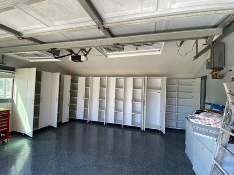 Custom reach-in closets designed for efficient and stylish storage.