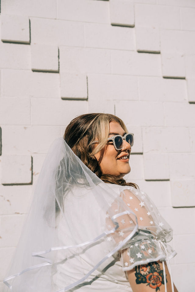 Vegas elopement photographer brazen honey films captures couple downtown vegas at sure thing chapel