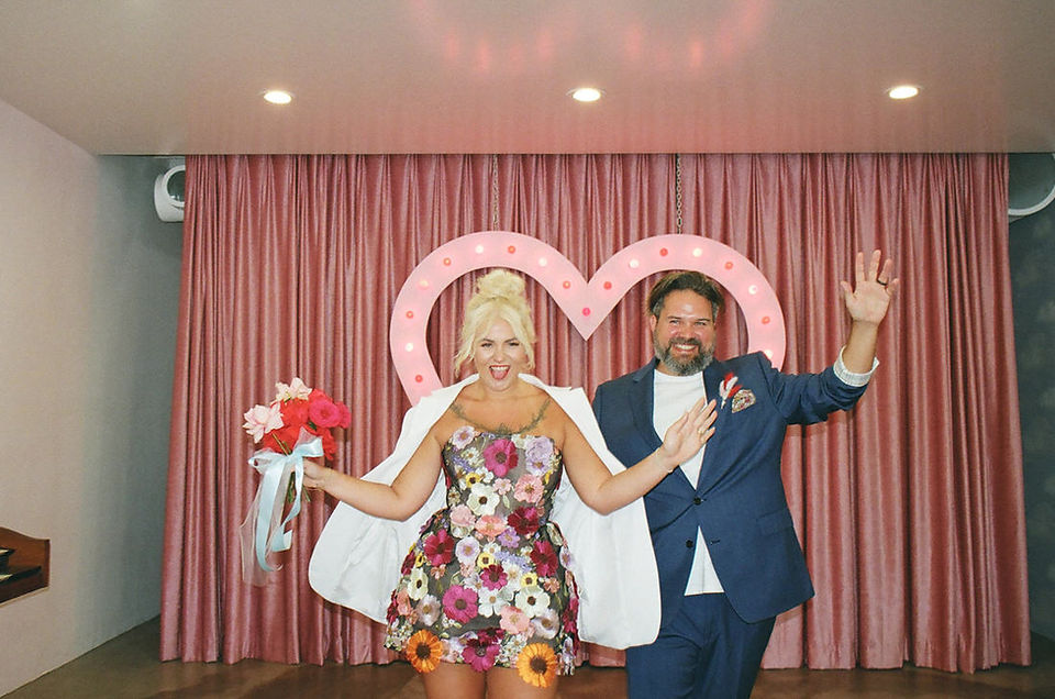 An intimate wedding ceremony inside the charming Sure Thing Las Vegas chapel, captured on 35mm film by brazen honey films.