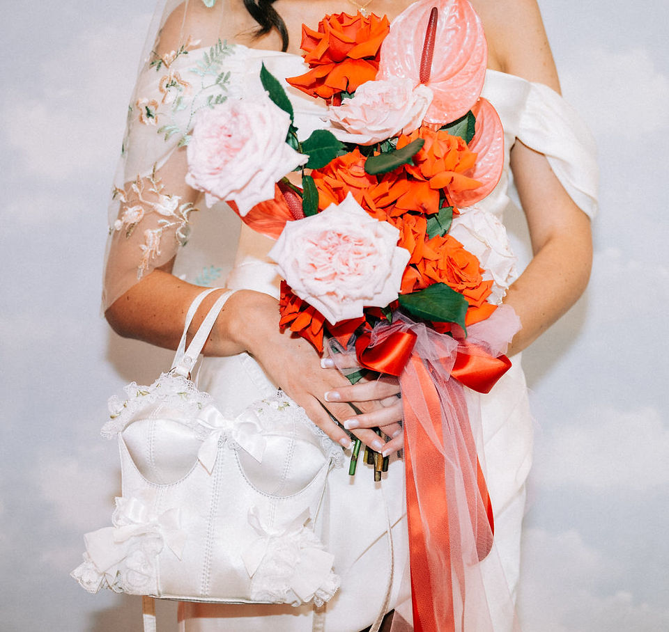 Las Vegas wedding photographer brazen honey films captures an epic elopement at sure thing chapel with elvis officiant. Photoshoot at the neon museum and downtown las vegas with neon lights.