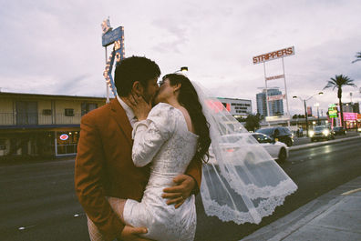 35mm film photograph of the little white wedding chapel  at night by las vegas elopement photographer brazen honey films
