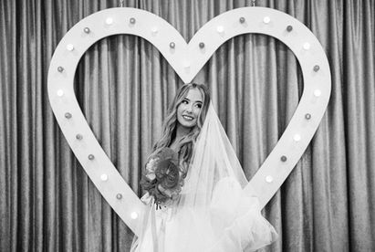 35mm film photo by las vegas elopement photographer brazen honey films. couple gets married at sure thing chapel with pink vintage vibes.