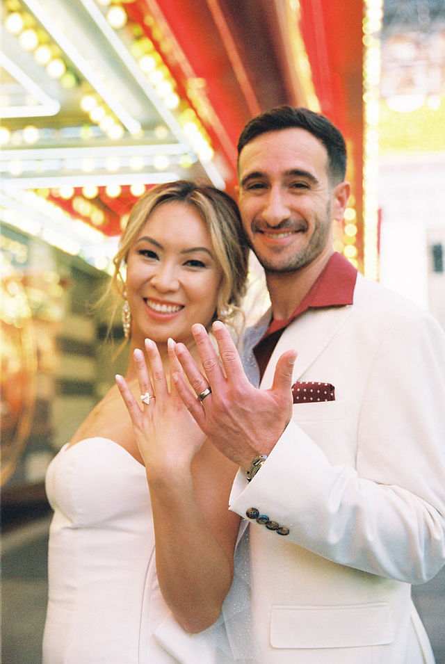 Kitsch elopement at the little white wedding chapel in las vegas shot on 35mm film. Neon lights wedding portraits by wedding photographers brazen honey films