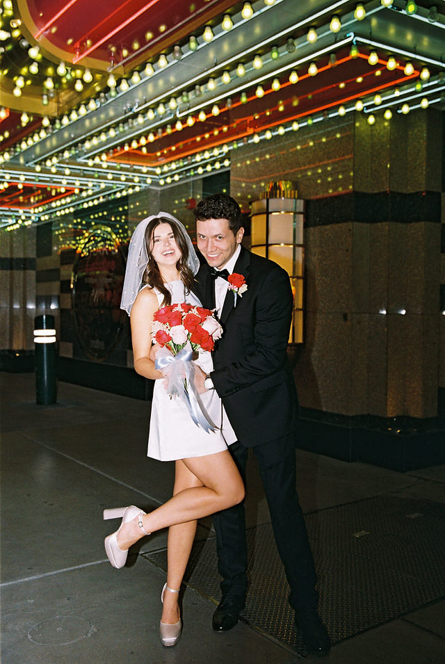 Las Vegas elopement film photographer brazen honey captures vintage inspired elopement at the little white wedding chapel. Wedding photos captured on 35mm film in downtown vegas under the neon lights.