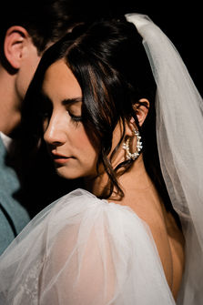 Bride and groom take wedding portraits in downtown las vegas under the neon lights. Captured by las vegas elopement photographer brazen honey films
