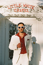Kitsch elopement at the little white wedding chapel in las vegas shot on 35mm film. Neon lights wedding portraits by wedding photographers brazen honey films