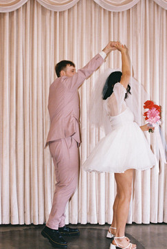 Las vegas elopement film photographer captures weddings on 35mm film. Vegas kitsch wedding vibes at the sure thing chapel. Analog photobooth in downtown las vegas. 