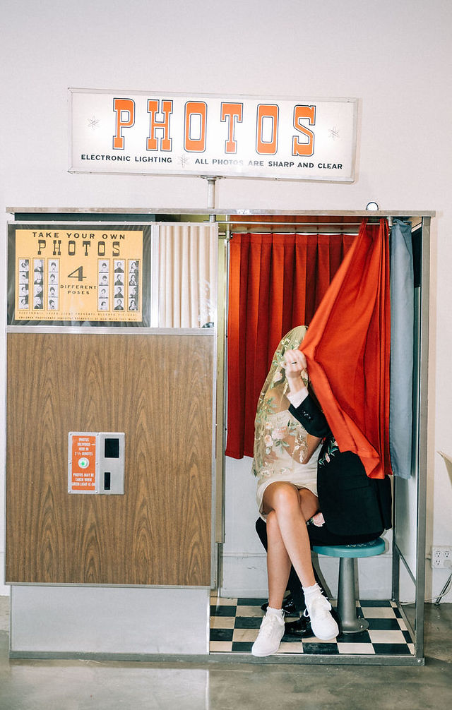 Las Vegas wedding photographer brazen honey films captures an epic elopement at sure thing chapel with elvis officiant. Photoshoot at the neon museum and downtown las vegas with neon lights.
