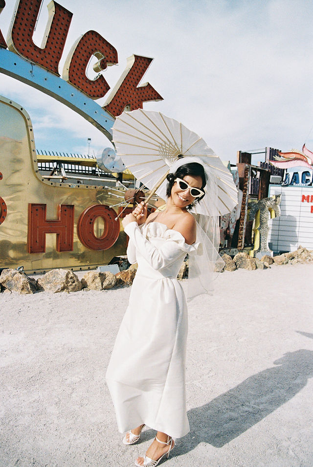 Couple with kitschy style gets married at the neon museum. Las Vegas wedding and elopement photographer brazen honey films captures their wedding on 35mm film. Vibrant colors and timeless wedding portraits. 