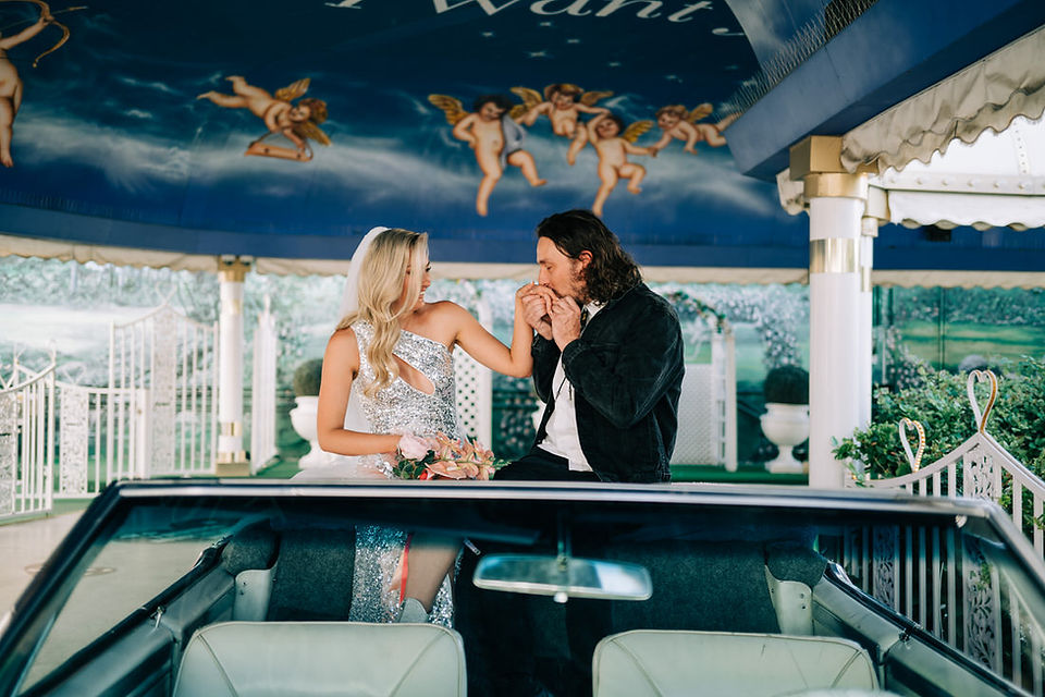 Las Vegas elopement photographer captures vibrant wedding at the little white wedding chapel.