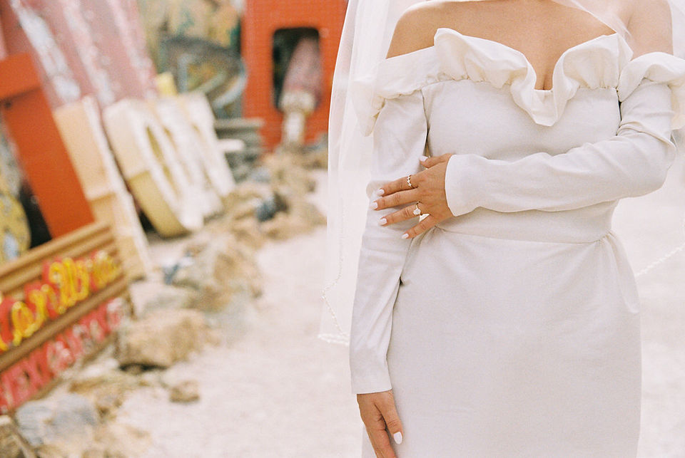 Couple with kitschy style gets married at the neon museum. Las Vegas wedding and elopement photographer brazen honey films captures their wedding on 35mm film. Vibrant colors and timeless wedding portraits. 