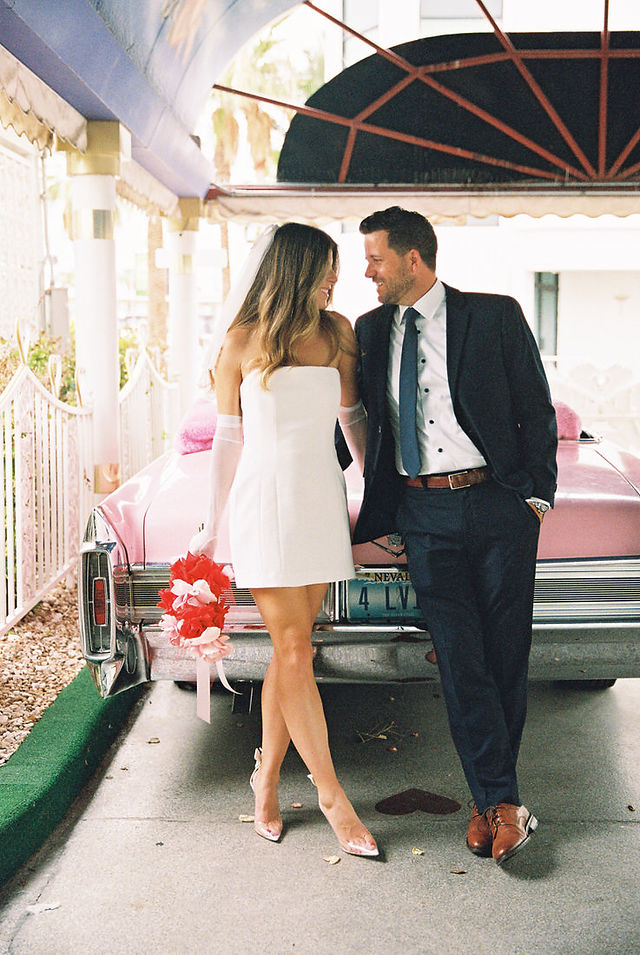 Las Vegas Vow Renewal at the Little White wedding chapel captured on 35mm film by elopement photographers brazen honey films. Tunnel of love elopement photos