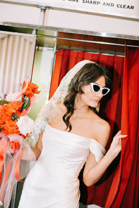 Las Vegas wedding photographer brazen honey films captures an epic elopement at sure thing chapel with elvis officiant. Photoshoot at the neon museum and downtown las vegas with neon lights.