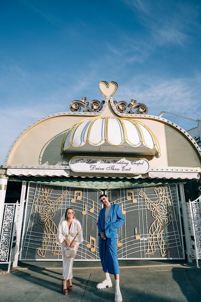 las vegas elopement photographer brazen honey films captures fun and colorful wedding at the little white wedding chapel in downtown with elvis officiant