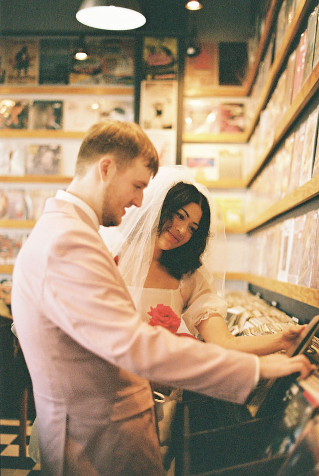 Las vegas elopement film photographer captures weddings on 35mm film. Vegas kitsch wedding vibes at the sure thing chapel. Analog photobooth in downtown las vegas.