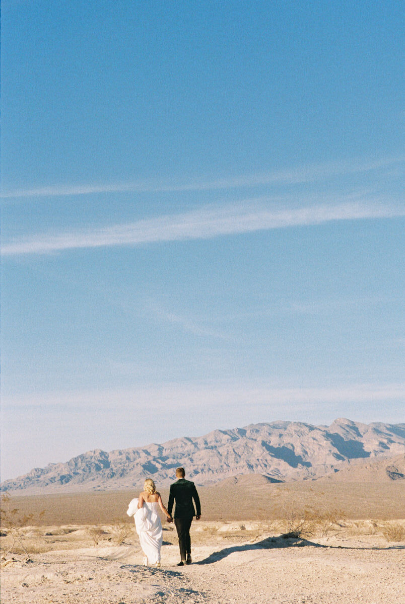 Our Las Vegas elopement was truly one for the books! From stunning 35mm film photos captured by @brazenhoneyfilms, romantic nuptials at the iconic Little White Wedding Chapel and a stunning neon museum backdrop, to our videographer shooting in the stunning Nevada desert.. we couldn't have asked for a better day!