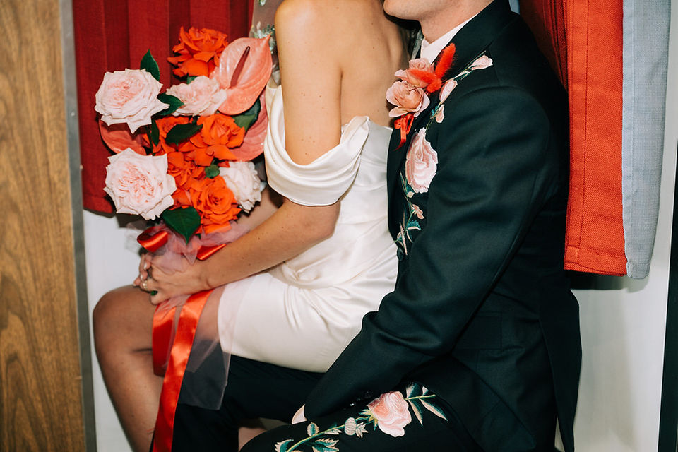 Las Vegas wedding photographer brazen honey films captures an epic elopement at sure thing chapel with elvis officiant. Photoshoot at the neon museum and downtown las vegas with neon lights.