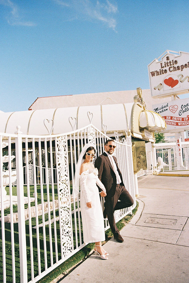 Couple with kitschy style gets married at the little white wedding chapel. Las Vegas wedding and elopement photographer brazen honey films captures their wedding on 35mm film. Vibrant colors and timeless wedding portraits. 