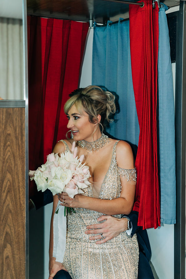 Sure thing chapel on fremont street, vintage photobooth. Captured by las vegas elopement photographer brazen honey films