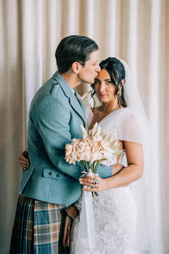 Bride and groom take wedding portraits at the sure thing chapel. captured by las vegas wedding photographer brazen honey films