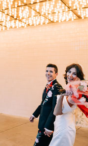 Las Vegas wedding photographer brazen honey films captures an epic elopement at sure thing chapel with elvis officiant. Photoshoot at the neon museum and downtown las vegas with neon lights. 