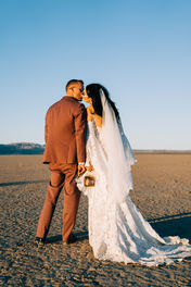 Bride and groom wedding golden hour portraits in the desert, captured by Las Vegas elopement photographer brazen honey films.