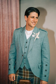 Groom stands at the altar at the sure thing chapel waiting for his bride. Captured by las vegas elopement photographer brazen honey films