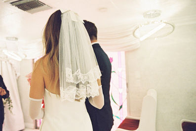 Las Vegas Vow Renewal at the Little White wedding chapel captured on 35mm film by elopement photographers brazen honey films. Tunnel of love elopement photos