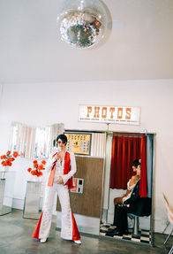 Las Vegas wedding photographer brazen honey films captures an epic elopement at sure thing chapel with elvis officiant. Photoshoot at the neon museum and downtown las vegas with neon lights.