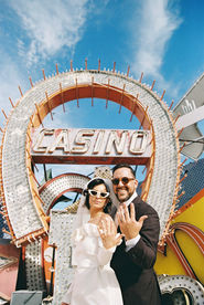 Couple with kitschy style gets married at the neon museum. Las Vegas wedding and elopement photographer brazen honey films captures their wedding on 35mm film. Vibrant colors and timeless wedding portraits.