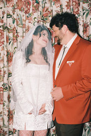 35mm film photograph of the little white wedding chapel at night by las vegas elopement photographer brazen honey films