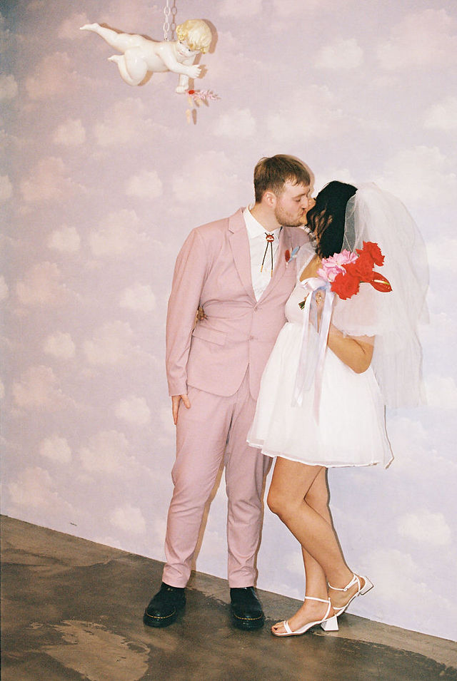 Las vegas elopement film photographer captures weddings on 35mm film. Vegas kitsch wedding vibes at the sure thing chapel. Analog photobooth in downtown las vegas.