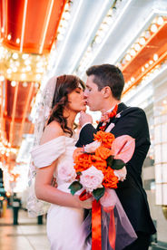 Las Vegas wedding photographer brazen honey films captures an epic elopement at sure thing chapel with elvis officiant. Photoshoot at the neon museum and downtown las vegas with neon lights.