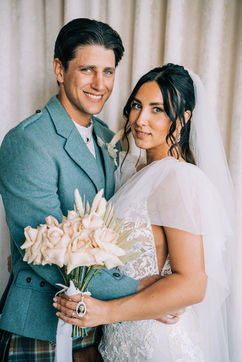 Bride and groom take wedding portraits at the sure thing chapel. captured by las vegas wedding photographer brazen honey films