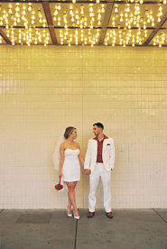 Kitsch elopement at the little white wedding chapel in las vegas shot on 35mm film. Neon lights wedding portraits by wedding photographers brazen honey films
