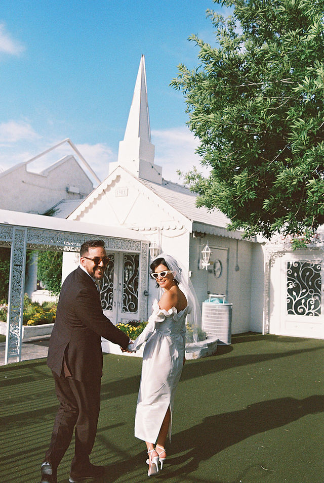 Couple with kitschy style gets married at the little white wedding chapel. Las Vegas wedding and elopement photographer brazen honey films captures their wedding on 35mm film. Vibrant colors and timeless wedding portraits. 