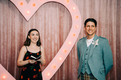 Groom stands at the altar at the sure thing chapel waiting for his bride. Captured by las vegas elopement photographer brazen honey films