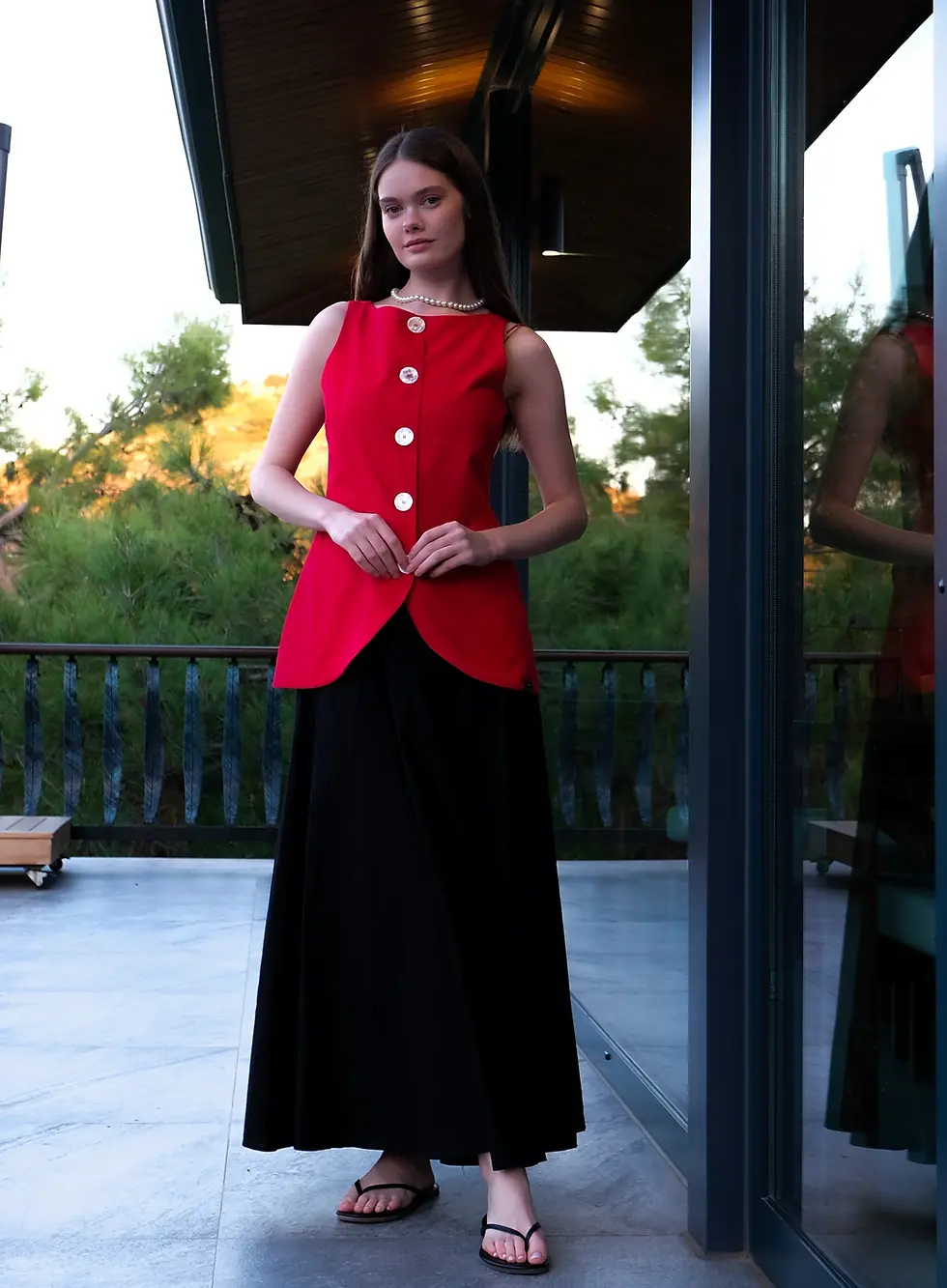 womens red buttoned vest top front view with black skirt on asarcik vineyards scene