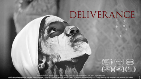 Black-and-white film poster showing a woman with white facial paint looking upward, light catching her face, with the title “Deliverance” in red serif text above.