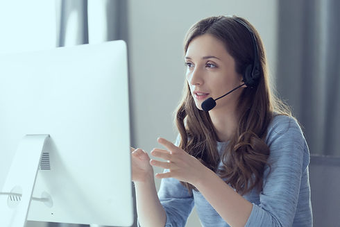 woman_talking_headset_with_hands_edited.jpg