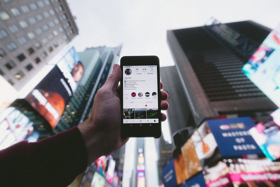 Phone screen on Instagram in urban setting