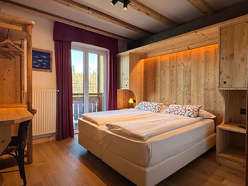 Camere hotel dolomiti trentino in legno