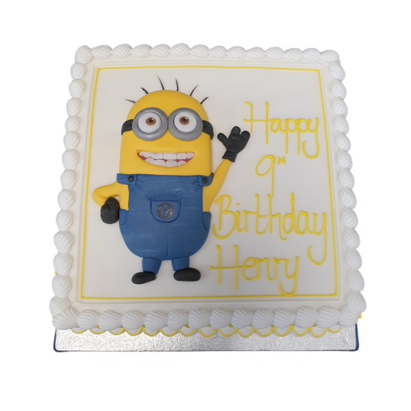 Adorable Minion-themed cake with intricate square design, perfect for themed parties and celebrations.