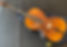 Cello sitting on a case
