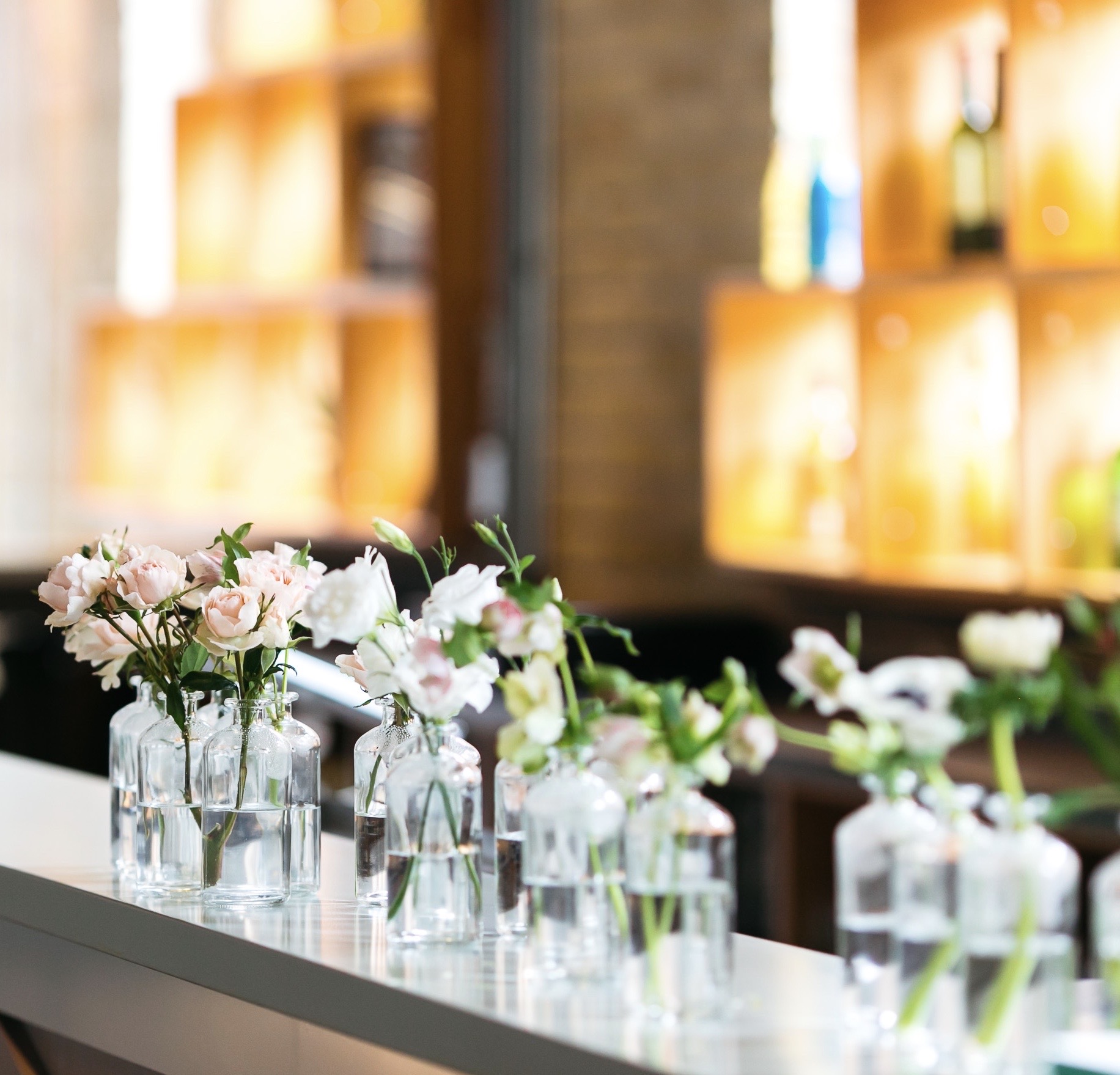 small bud vases on 2nd floor events bar
