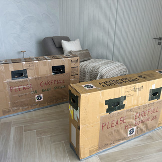 XPLORid - Cycling Nomads | Mr Blue Sky and Ms Sunshine in bicycle boxes