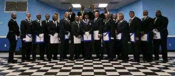 An image of The Grand Lodge Nairobi hotel, showcasing a Freemason poster about membership and wealth acquisition. To join the Freemasons, you must go through the process of becoming a Freemason, which involves membership in a Masonic society, joining a Masonic lodge, and undergoing Freemason initiation.