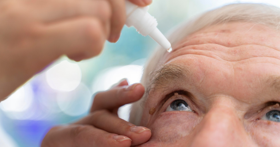 doctor-pouring-some-eye-drops-patient.jpg