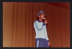 04 Linton Kwesi Johnson (performing) at Bogle-L'Ouverture Publications 10th Anniversary event. 1979.